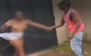 Nigerian Female Corper Beaten And Stripped Naked By Vigilante Group In Anambra (Watch The Video) Nigerian Female Corper Beaten